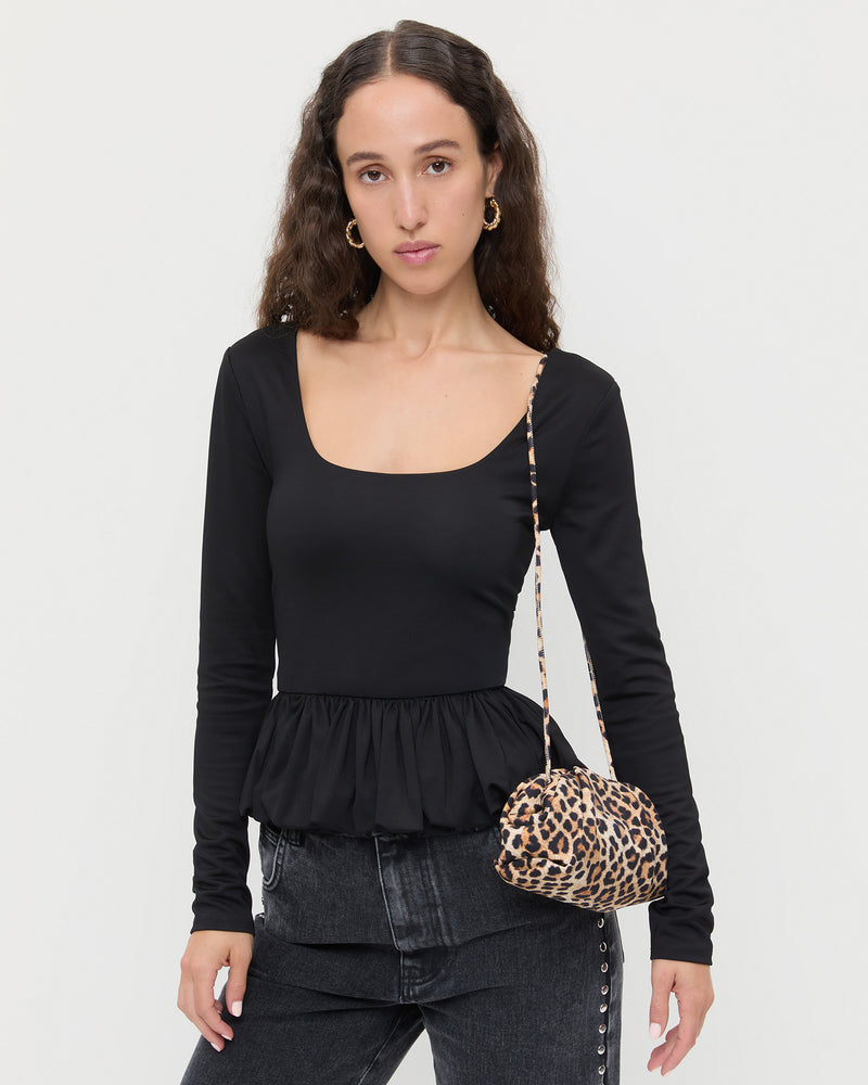 Bailey Leopard Jersey Dome Clutch, Posie Peplum Top in black, and Winona Denim Barrel Pant in black with crystal embellishments.