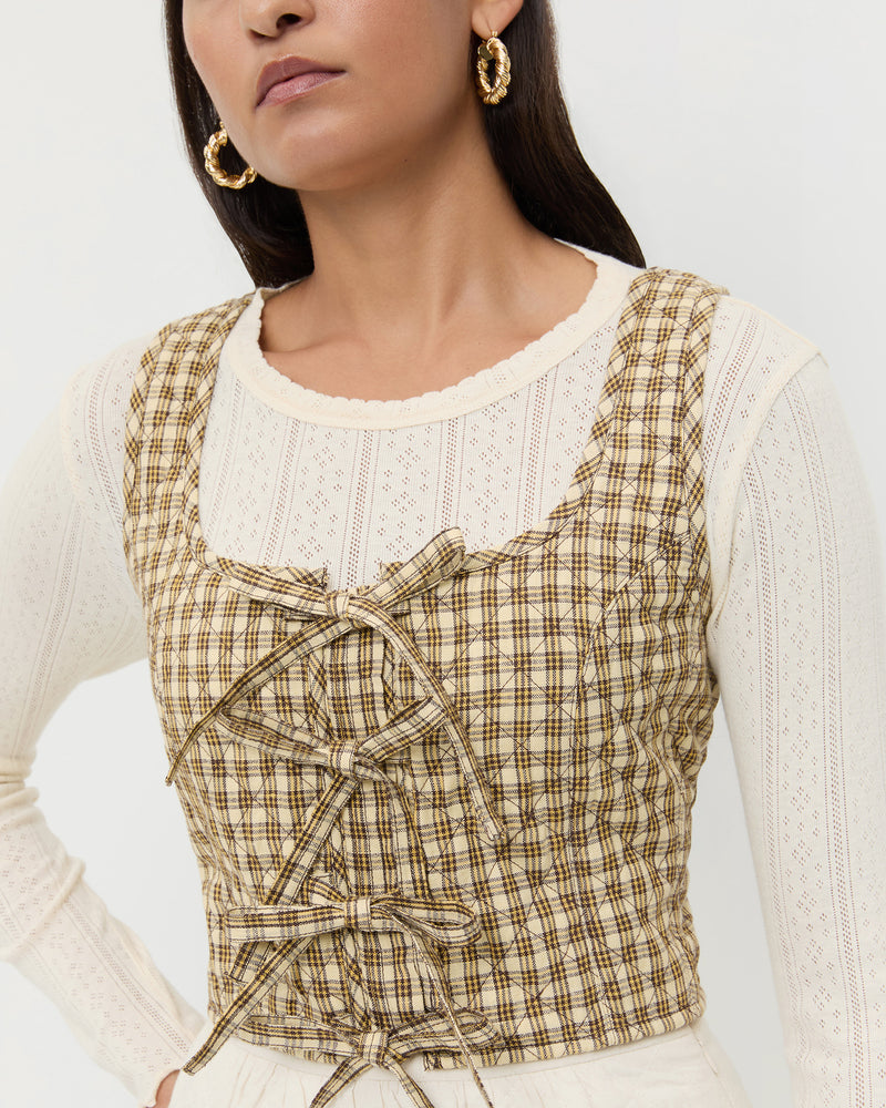 Callista Tie-Front Vest in brown/butter quilted plaid cotton and Lolo Pointelle Long Sleeve Top in cream pointelle cotton.