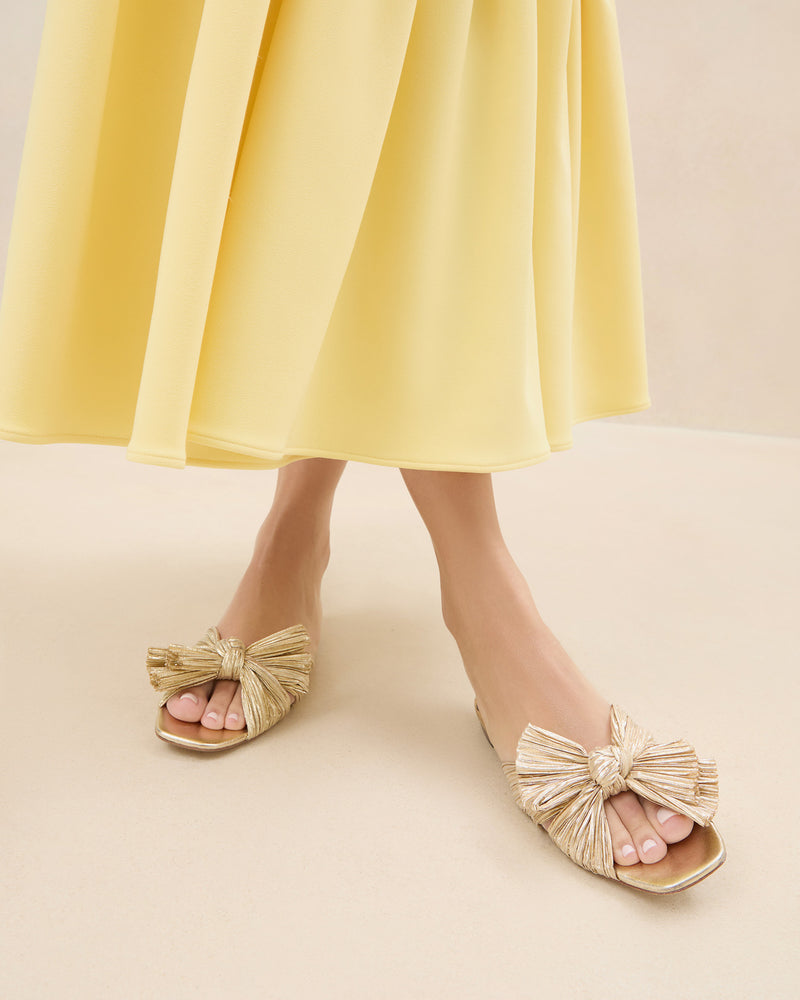 Daphne Gold Pleated Bow Slide in gold lamé