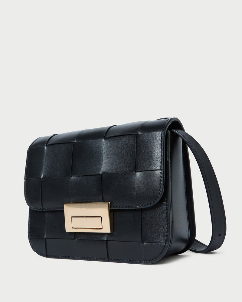 Desi Black Woven Leather Crossbody in black woven leather.