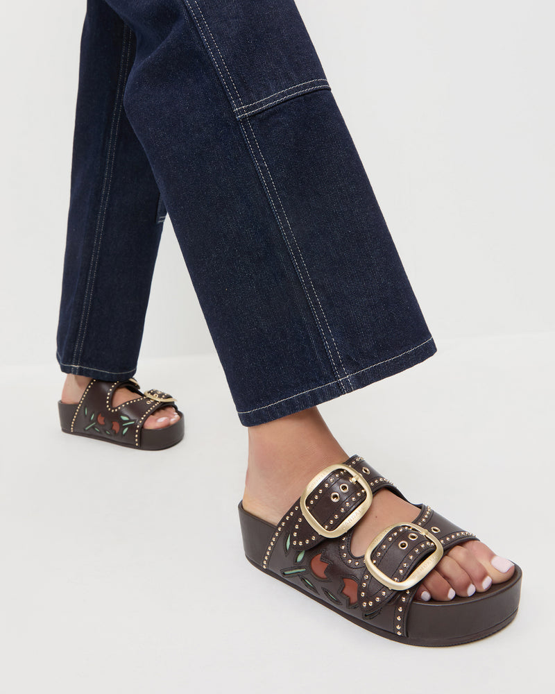 Eve Brown Tulip Two-Band Sandal in brown leather and Molly Workwear Jean in dark blue denim.