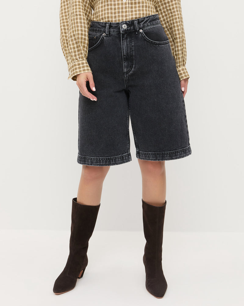 Everett Denim Short in washed black denim, Ken Shirt in brown butter plaid cotton, and Cleo Brown Suede Mid-Calf Boot.
