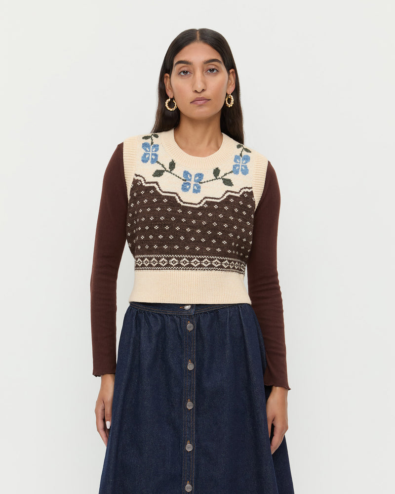 Heather Sweater Vest in Brown and Cream Floral wool, Lolo Pointelle Long Sleeve in brown espresso, and Ruthie Denim Skirt in dark blue.
