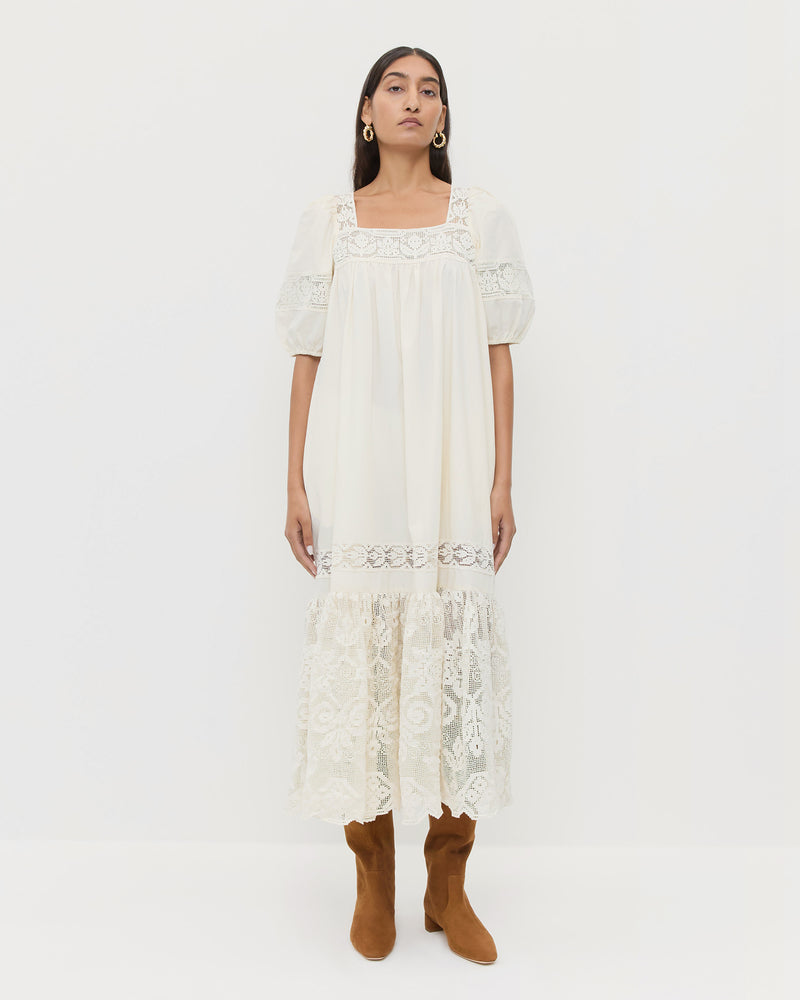 Jo Puff-Sleeve Dress in cream cotton and Indy Cacao Suede Tall Boot.