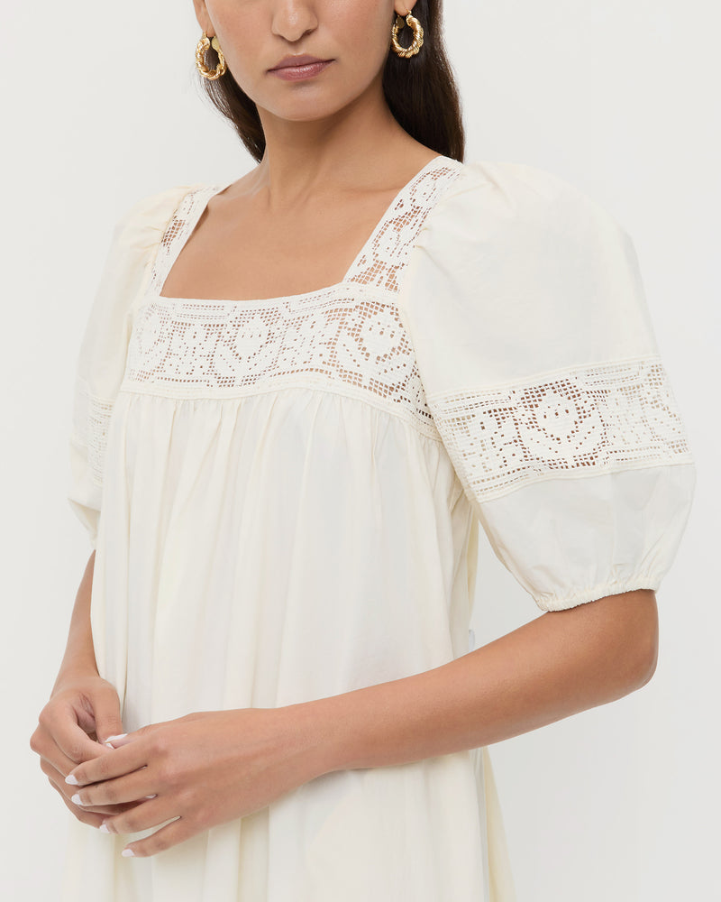 Jo Puff-Sleeve Dress in cream cotton.