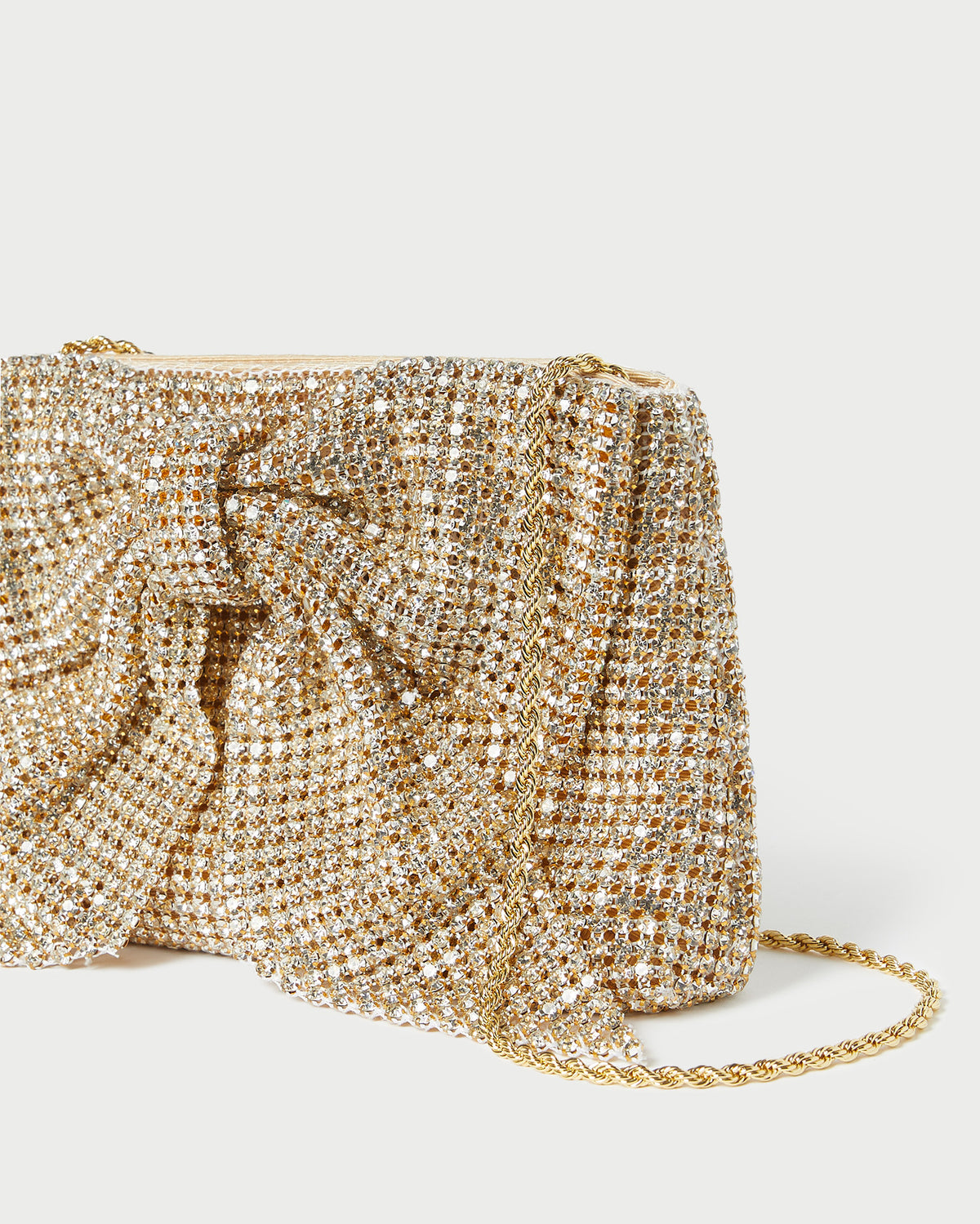 Jolene Gold Diamanté Bow Clutch in gold diamanté
