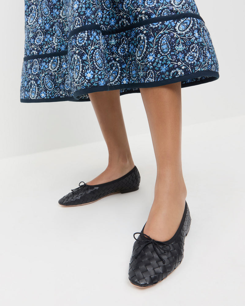 Landry Black Woven Ballet Flat in black woven leather and Ainsley Dress in blue floral paisely cotton.