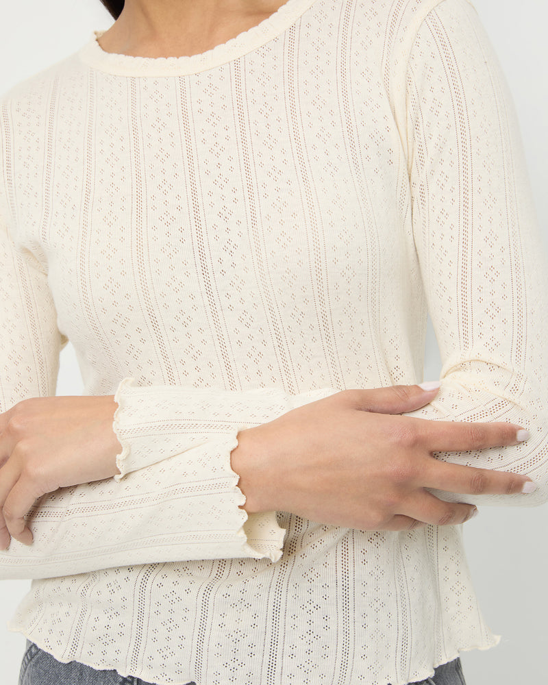Lolo Pointelle Long-Sleeve Tee in cream pointelle fabric.