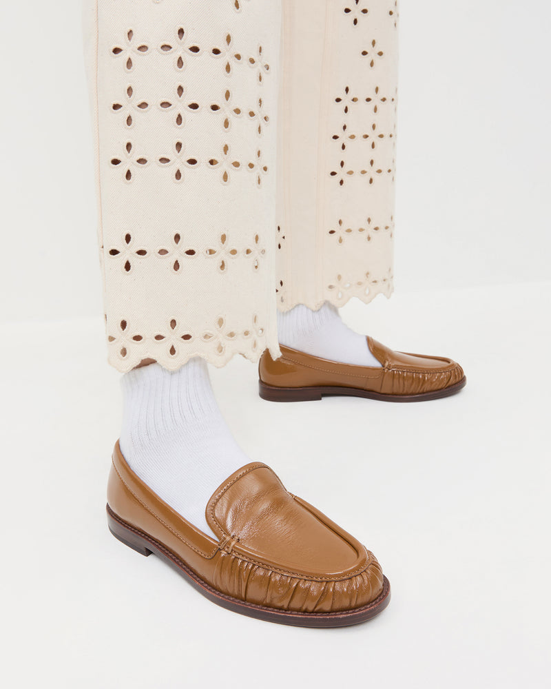 Lucille Safari Leather Loafer in safari brown leather and Demi Embroidered Pant in natural denim.