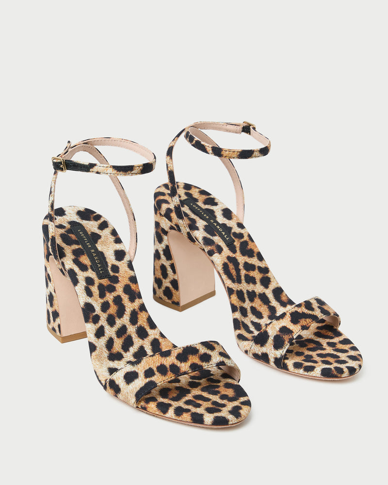 Malia Leopard Curved-Heel Sandal in leopard print jersey.