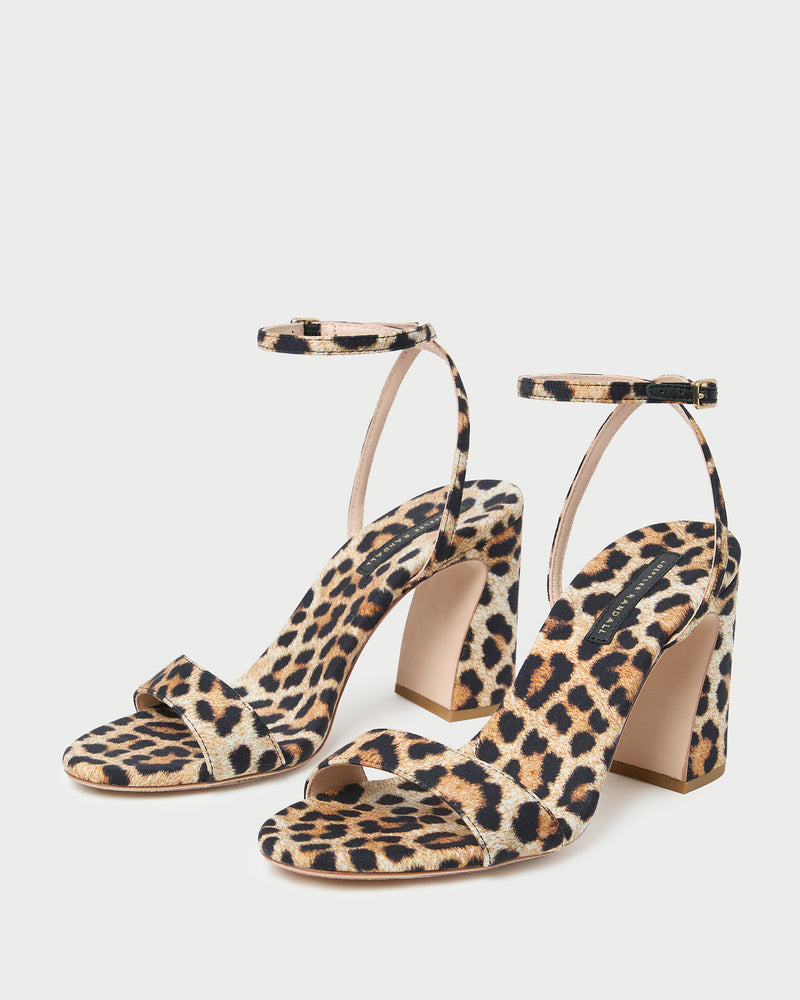 Malia Leopard Curved-Heel Sandal in leopard print jersey.
