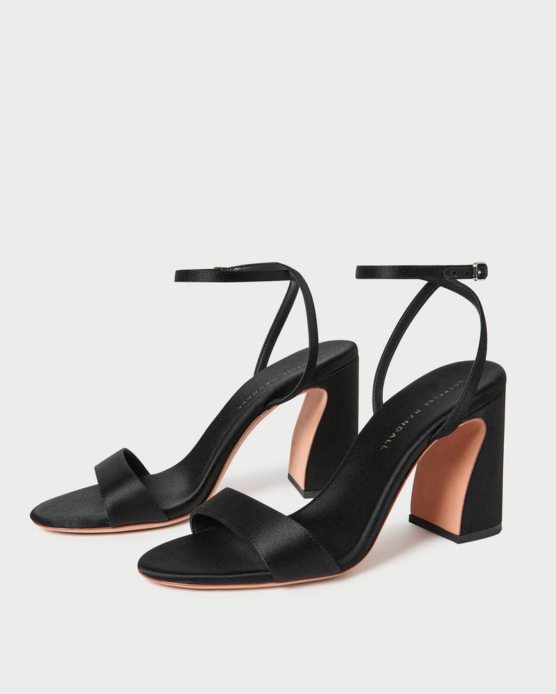Malia Black Satin Curved-Heel Sandal in black satin.