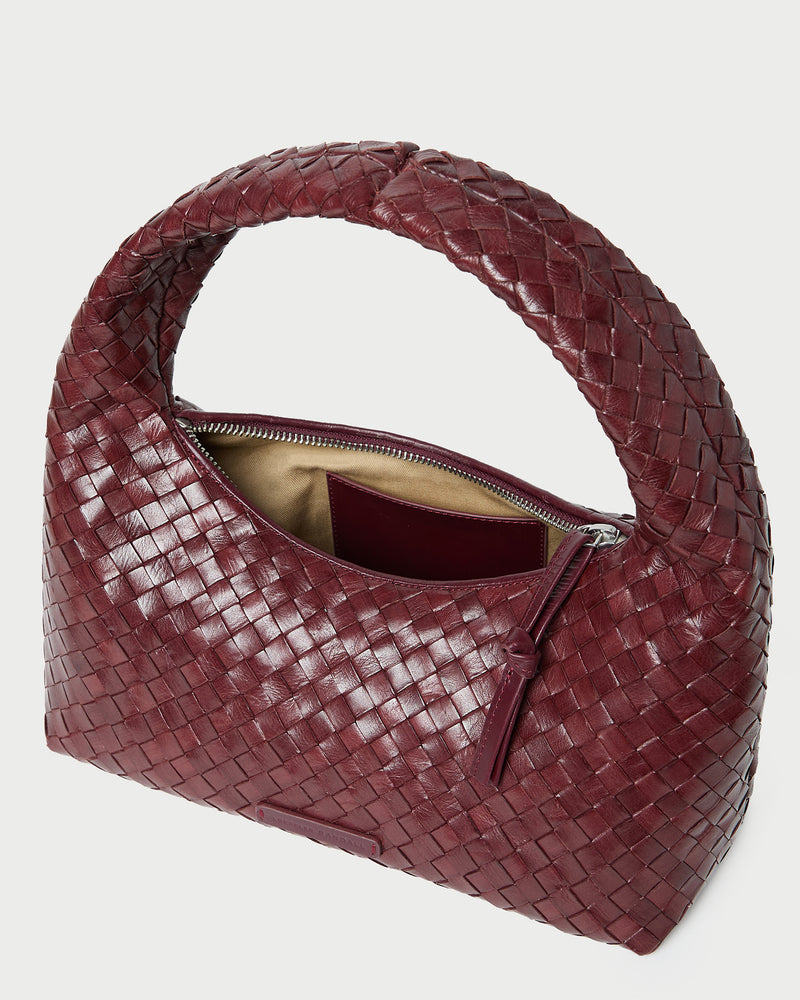 Mercer Maroon Woven Shoulder Bag in maroon woven leather.