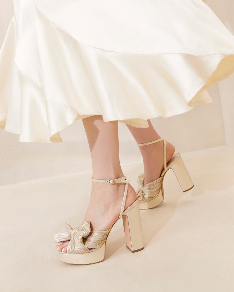 Natalia Platinum Platform Bow Heel in light champagne fabric