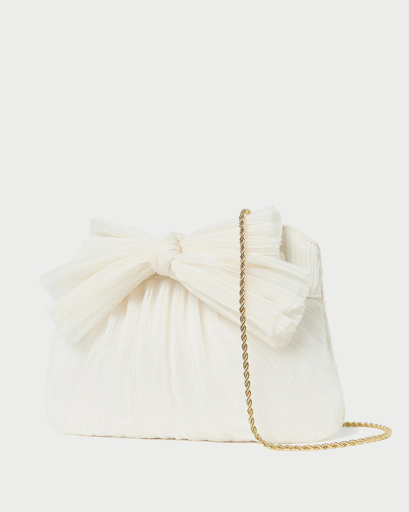 Rayne Pearl Bow Clutch in pearl fabric