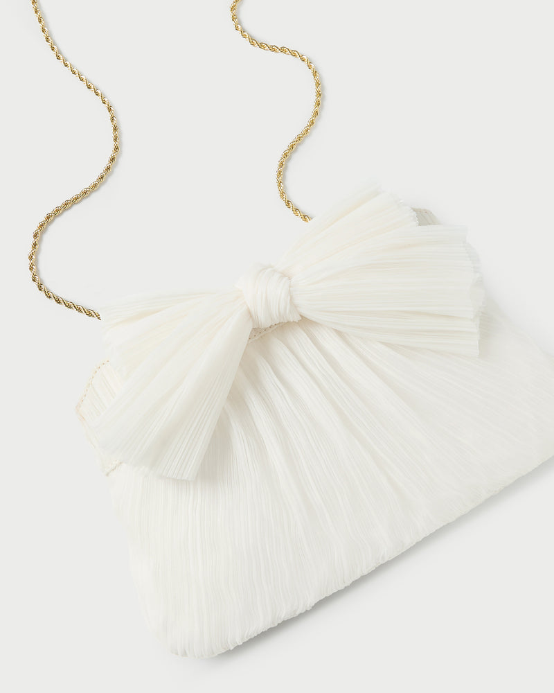 Rayne Pearl Bow Clutch in pearl fabric