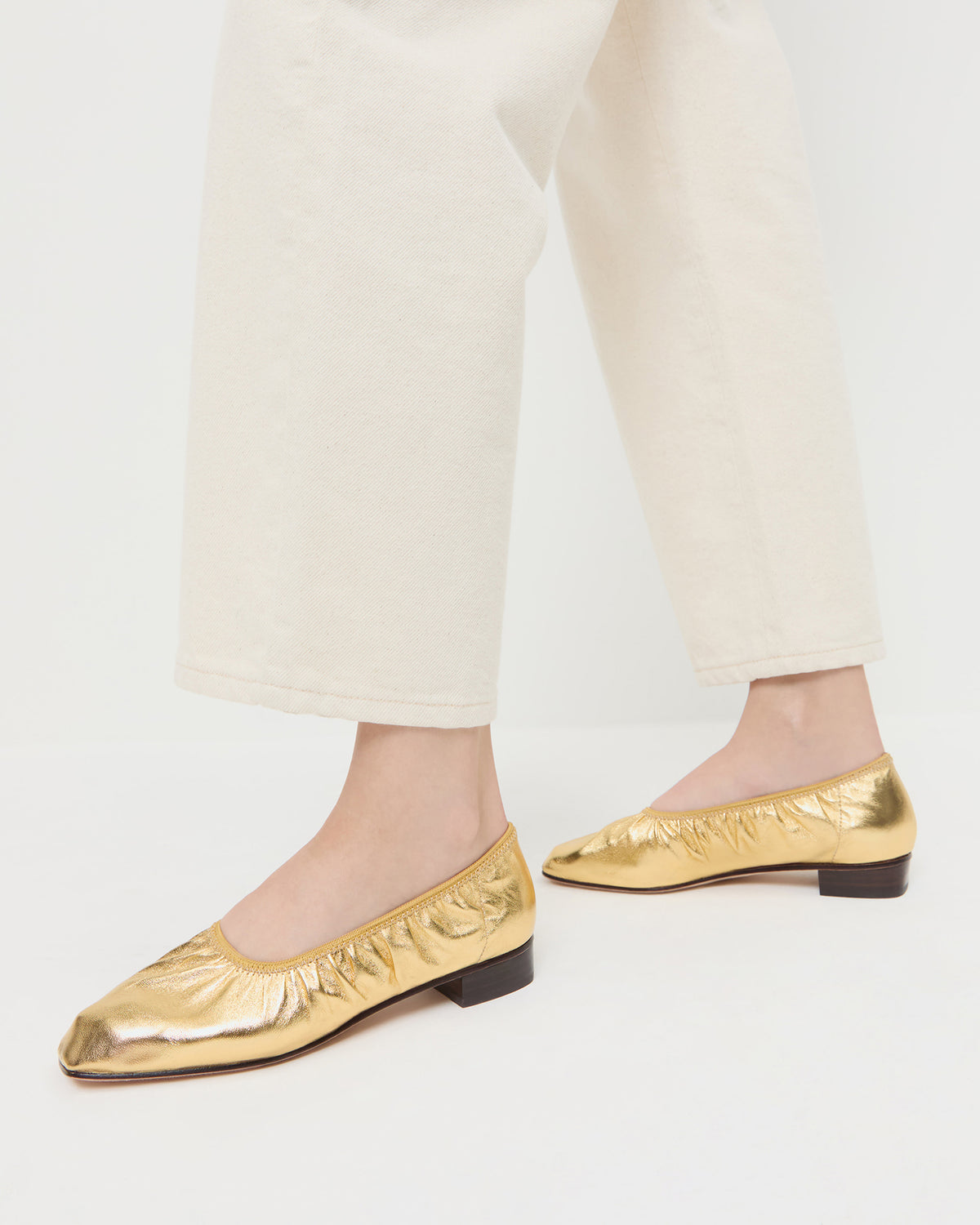 Tove Gold Leather Ballet Pump in gold leather and Winona Denim Pant in natural denim.