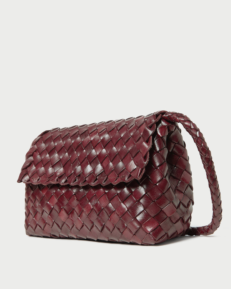 Vinnie Maroon Woven Leather Crossbody in maroon woven leather.