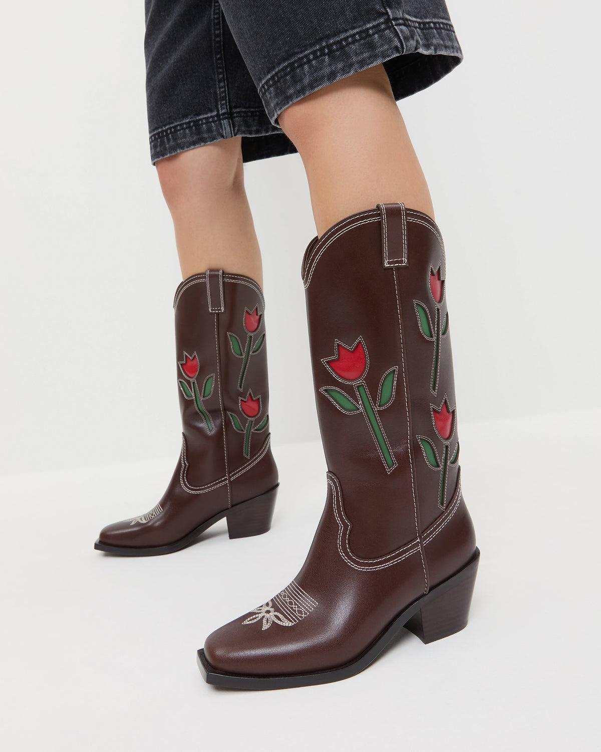 Wilder Espresso Leather Tulip Boot in espresso brown leather and Everett Denim Short in washed black denim.