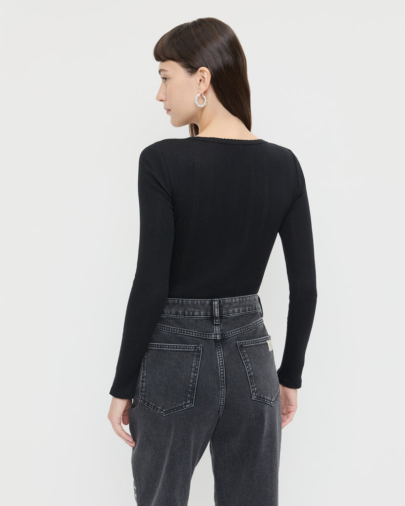 Kaya Pointelle Long-Sleeve Bodysuit in black and Winona Denim Barrel Pant in washed black.