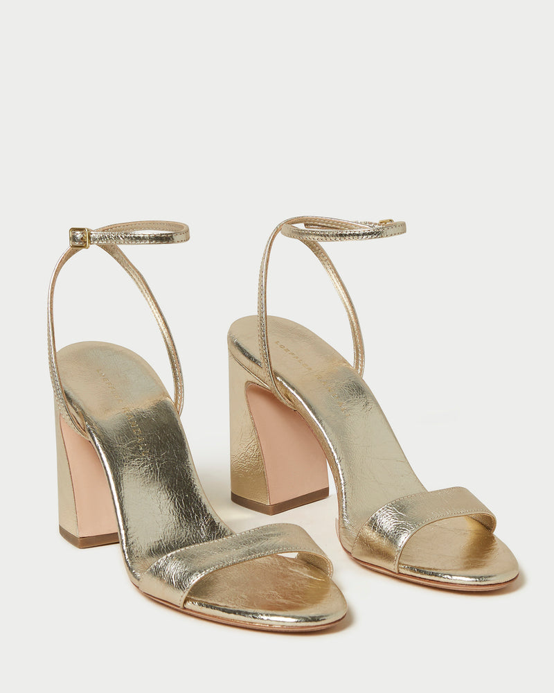 Malia Champagne Curved-Heel Sandal in metallic champagne leather