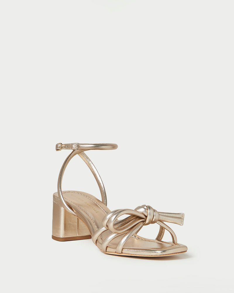 Mikel Champagne Bow Mid-Heel Sandal in metallic champagne nappa leather
