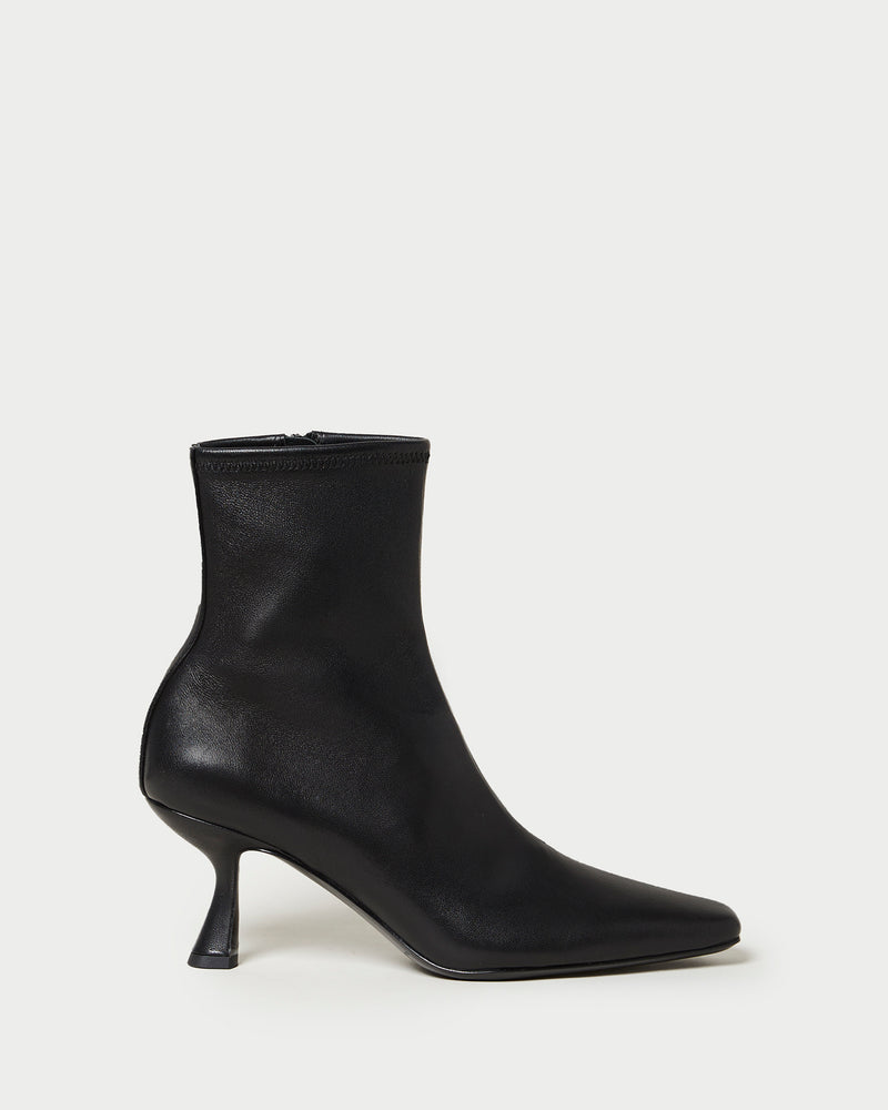 Thandy Black Leather Curved Heel Bootie in black leather.