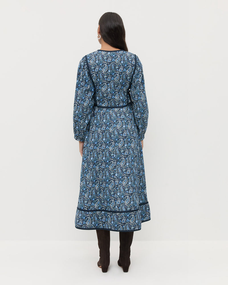 Ainsley Dress in quilted cotton with a blue paisley floral design and Marley Brown Suede Tall Boots.