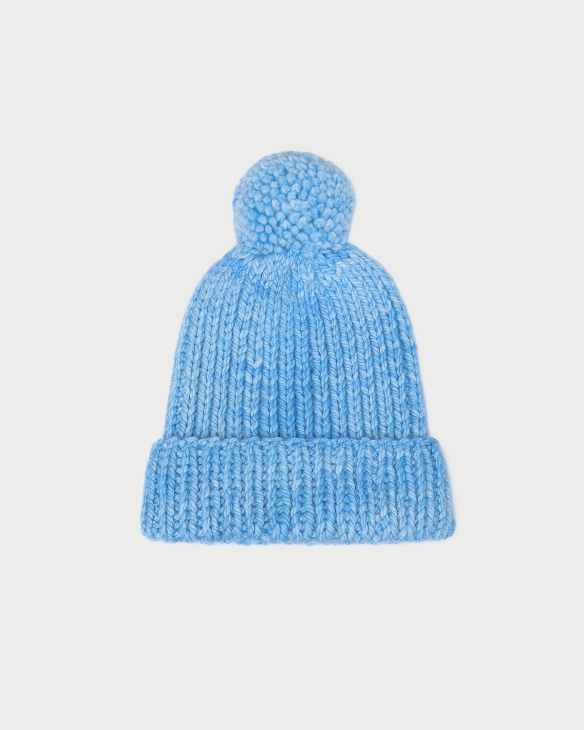 April Light Blue Pompom Hat in light blue knit wool.
