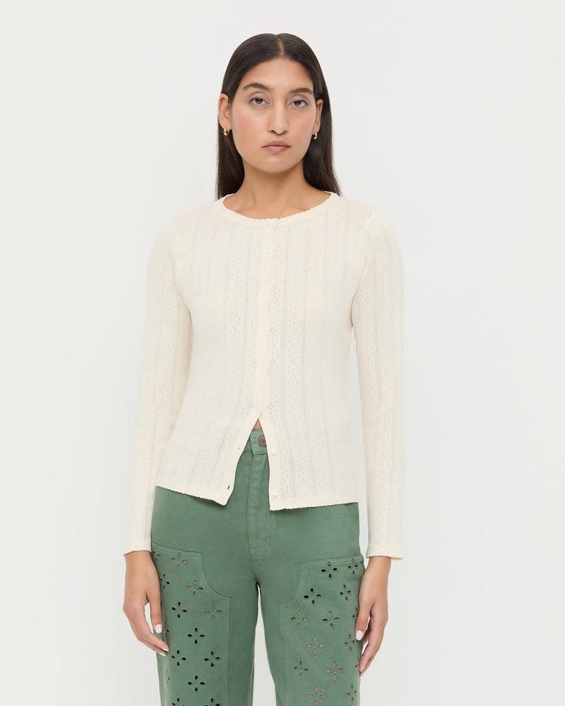 Ash Pointelle Cardigan, long-sleeve cardigan in cream pointelle cotton and Demi Embroidered Pant in sage green cotton.