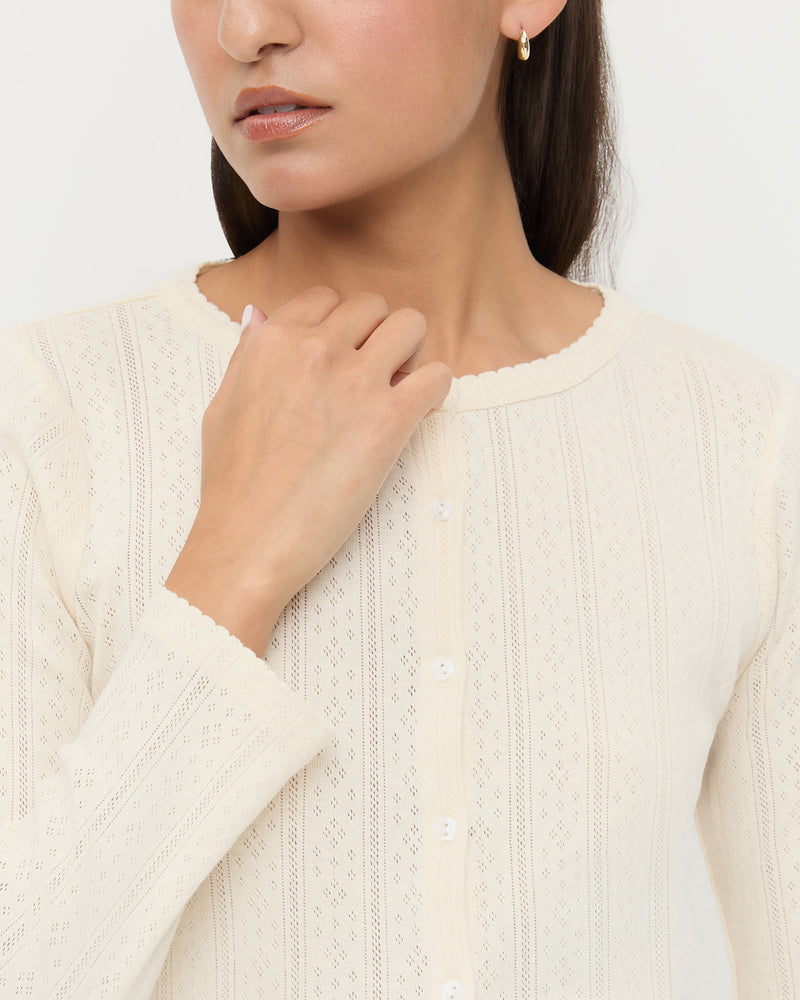 Ash Pointelle Cardigan, long-sleeve cardigan in cream pointelle cotton.