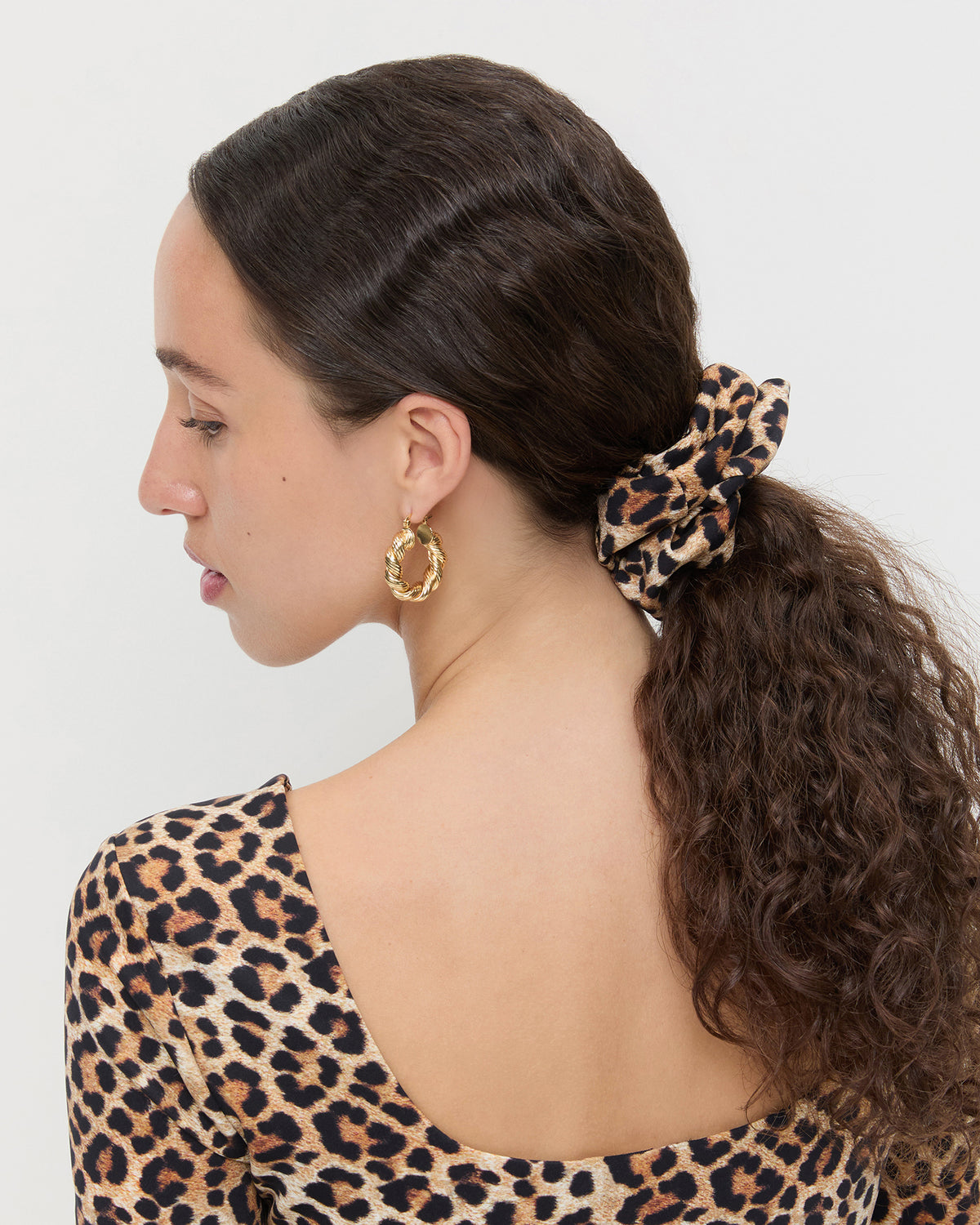 Astrid Leopard Jersey Scrunchie and Posie Peplum Top in leopard jersey.