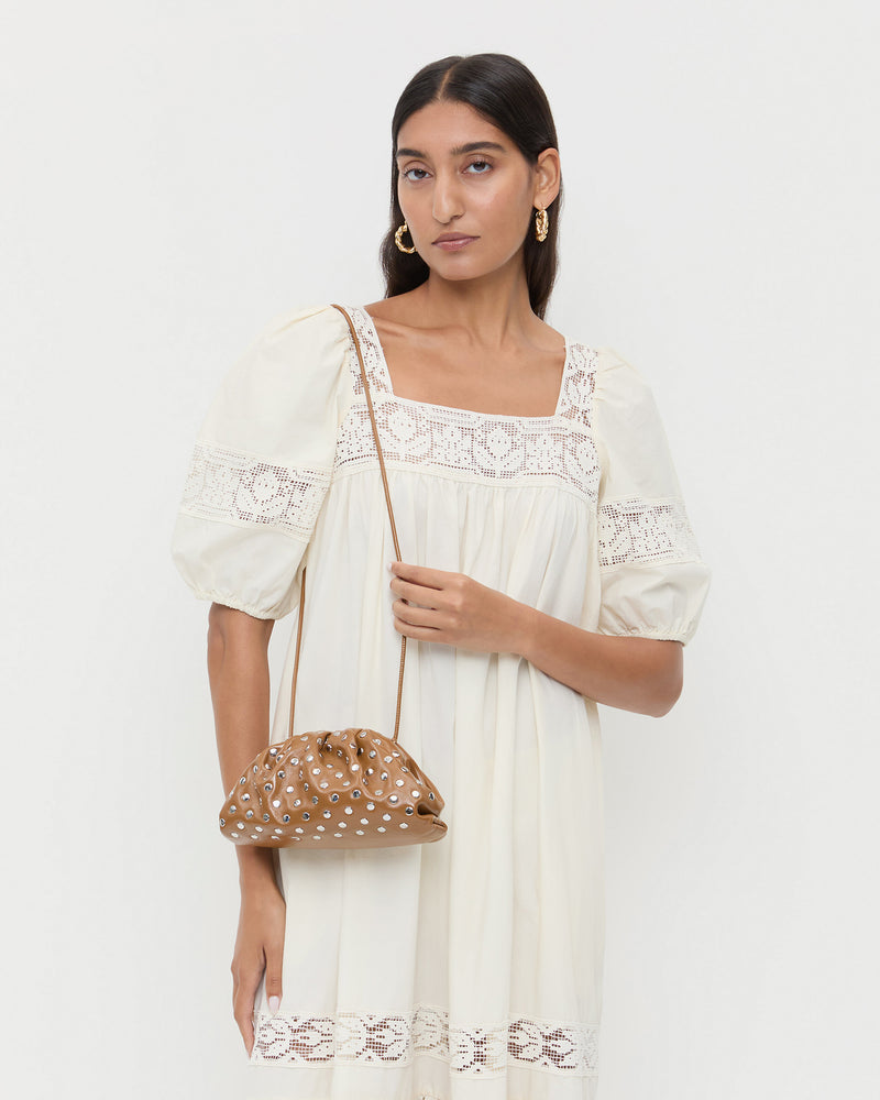 Bailey Safari/Silver Leather Dome Clutch and Jo Cream Puff Sleeve Dress
