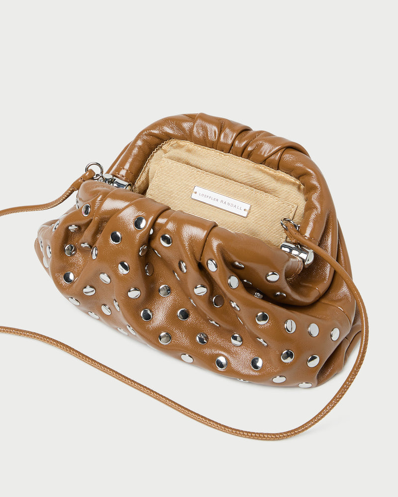 Bailey Safari/Silver Leather Dome Clutch in a safari tan leather with silver studs.