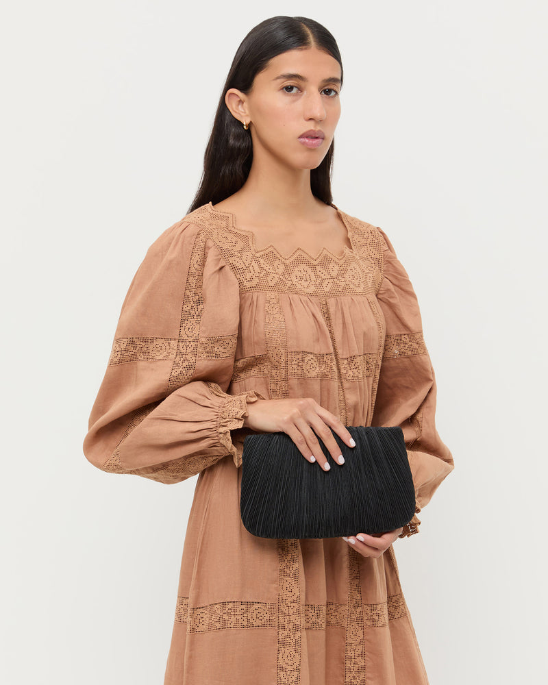 Brit Black Flat Pleated Clutch and Perrin Dress in light brown ramie.