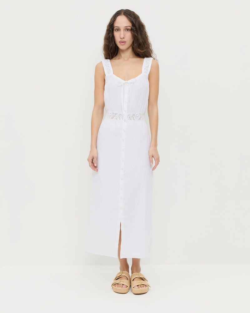 Clarissa Dress in white linen and Nico Natural Two−Band Sandal.