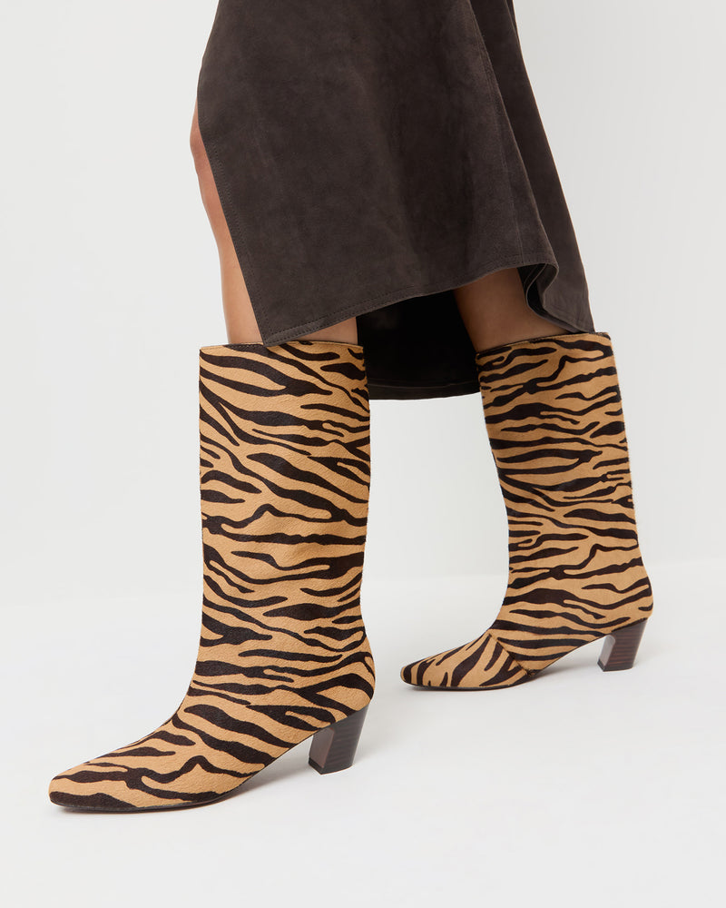 Cleo Zebra Mid-Calf Boot in zebra calf hair and Tansy Skirt in brown suede.