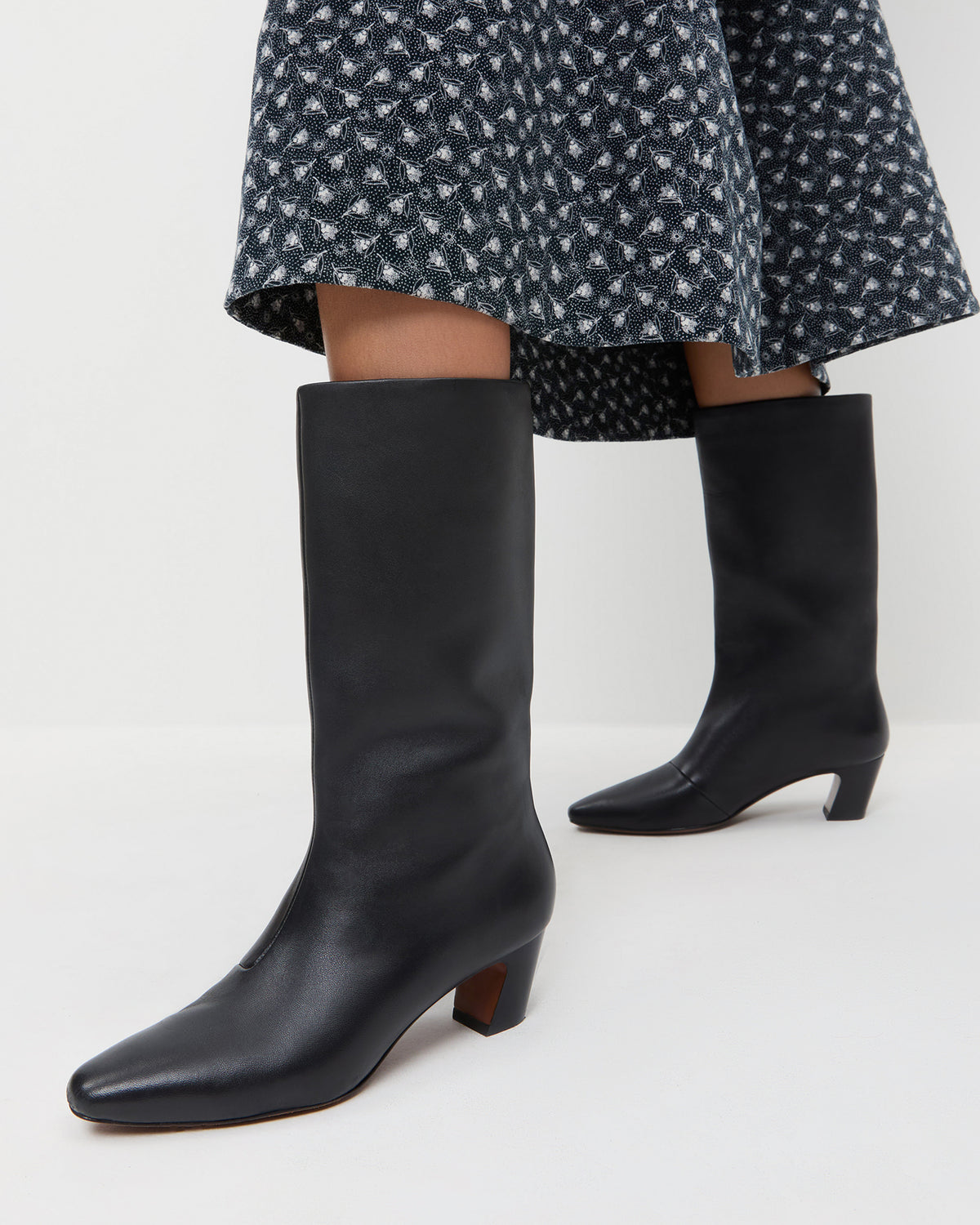 Cleo Black Leather Mid-Calf Boot in black leather and Maxwell Dress in Blue Paisley Floral.