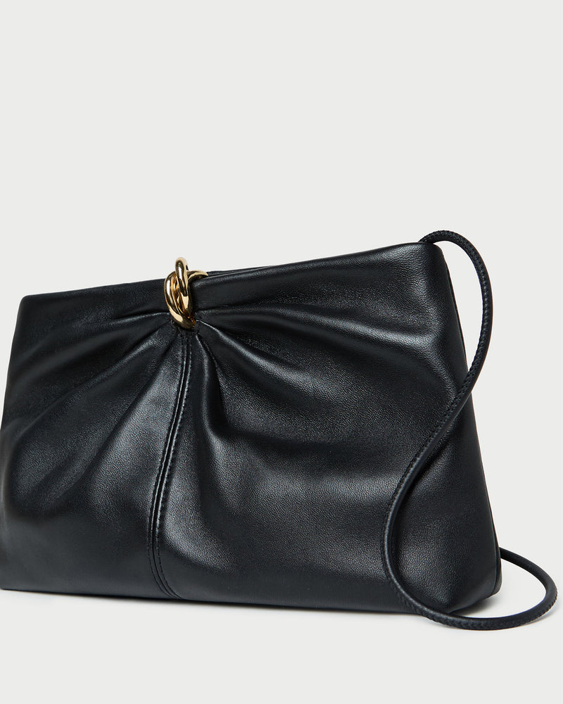 Corrine Black Leather Gathered Clutch in black leather with a gold accent.