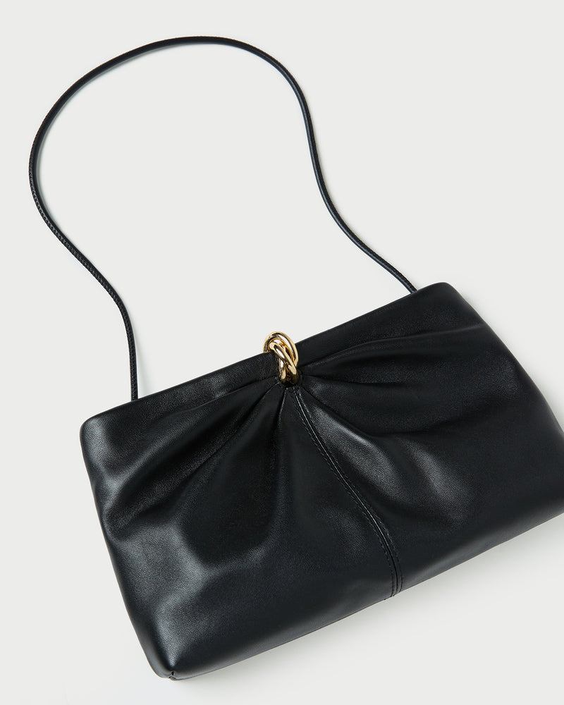 Corrine Black Leather Gathered Clutch in black leather with a gold accent.