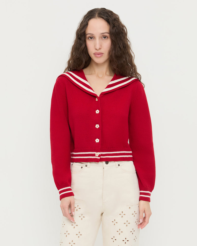 Cove Sweater in red wool and Demi Embroidered Pant in natural denim.