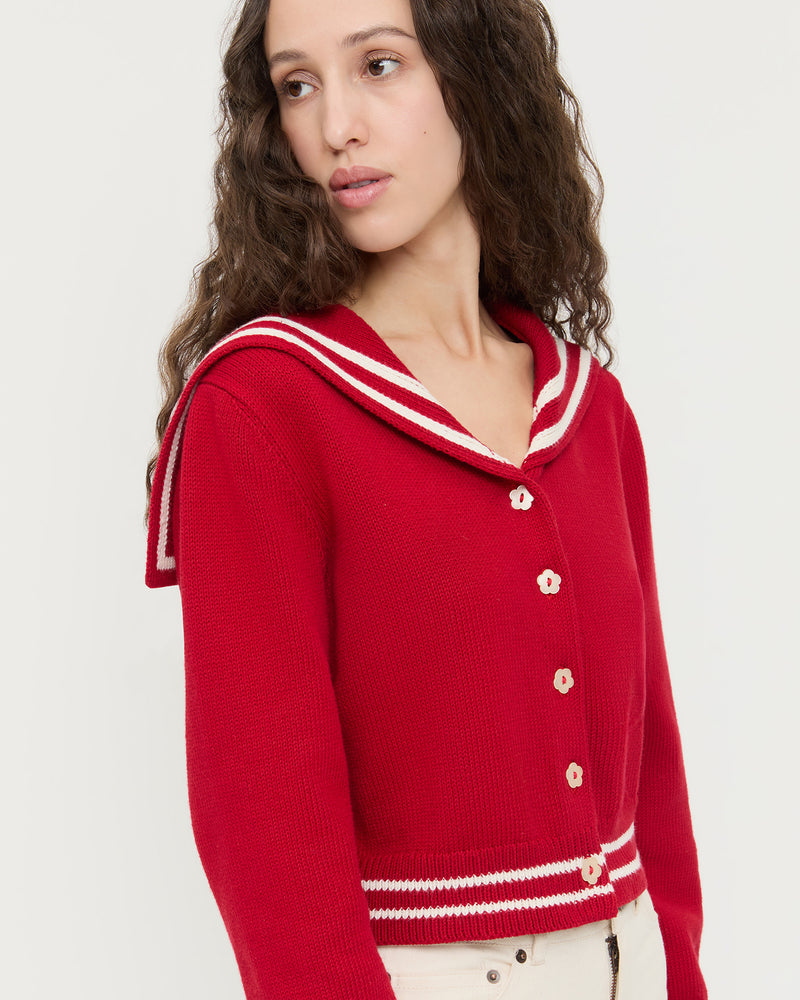 Cove Sweater in red wool and Demi Embroidered Pant in natural denim.
