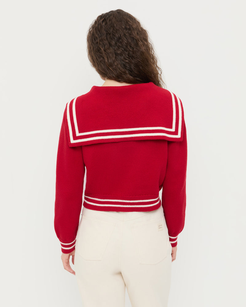 Cove Sweater in red wool and Demi Embroidered Pant in natural denim.