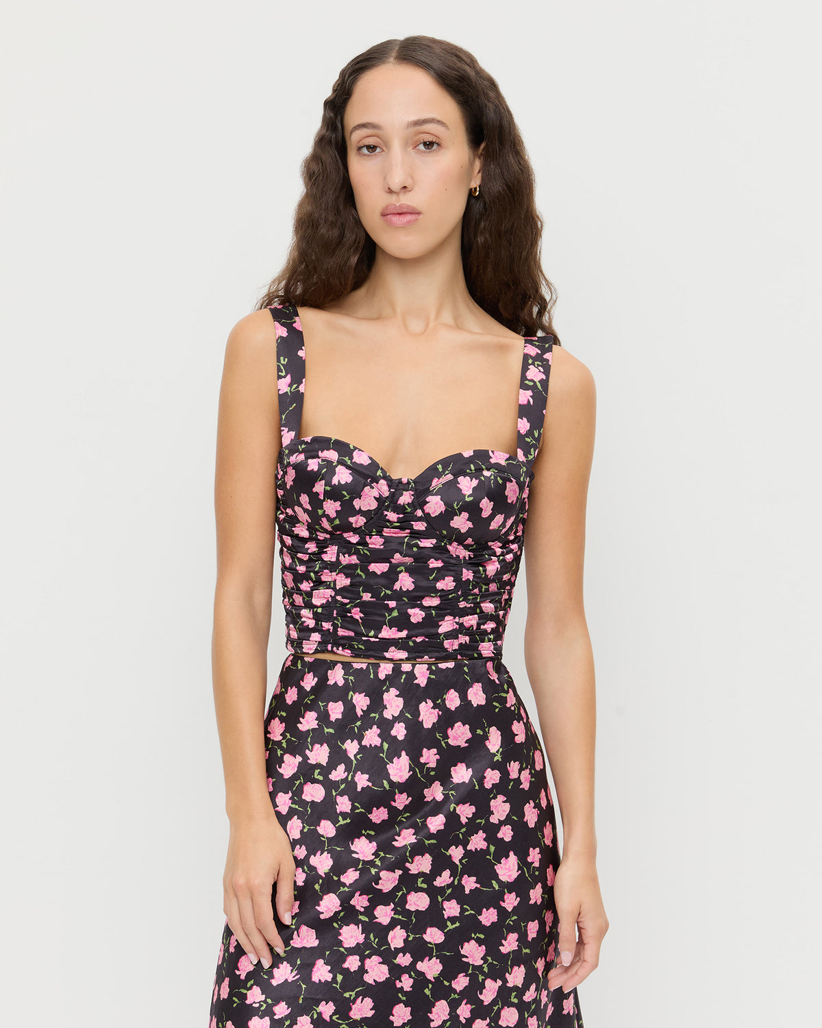 Cresta Top in black rosette textured fabric and Mandy Skirt in black rosette textured fabric.