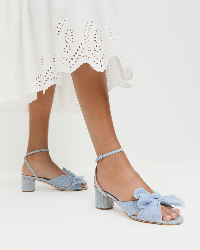 Dahlia Blue Pleated Bow Heel light blue fabric and Thelma Eyelet Dress in white cotton.