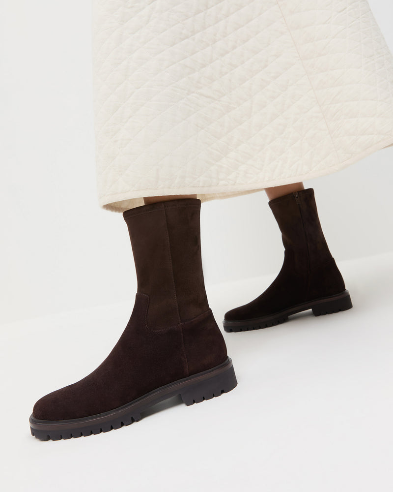 Danny Brown Stretch Suede Ankle Boot in brown suede and Clara Quilted Skirt in cream.