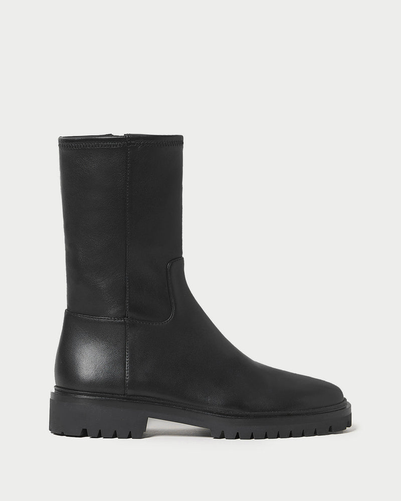 Danny Black Leather Lug Boot in black stretch leather.