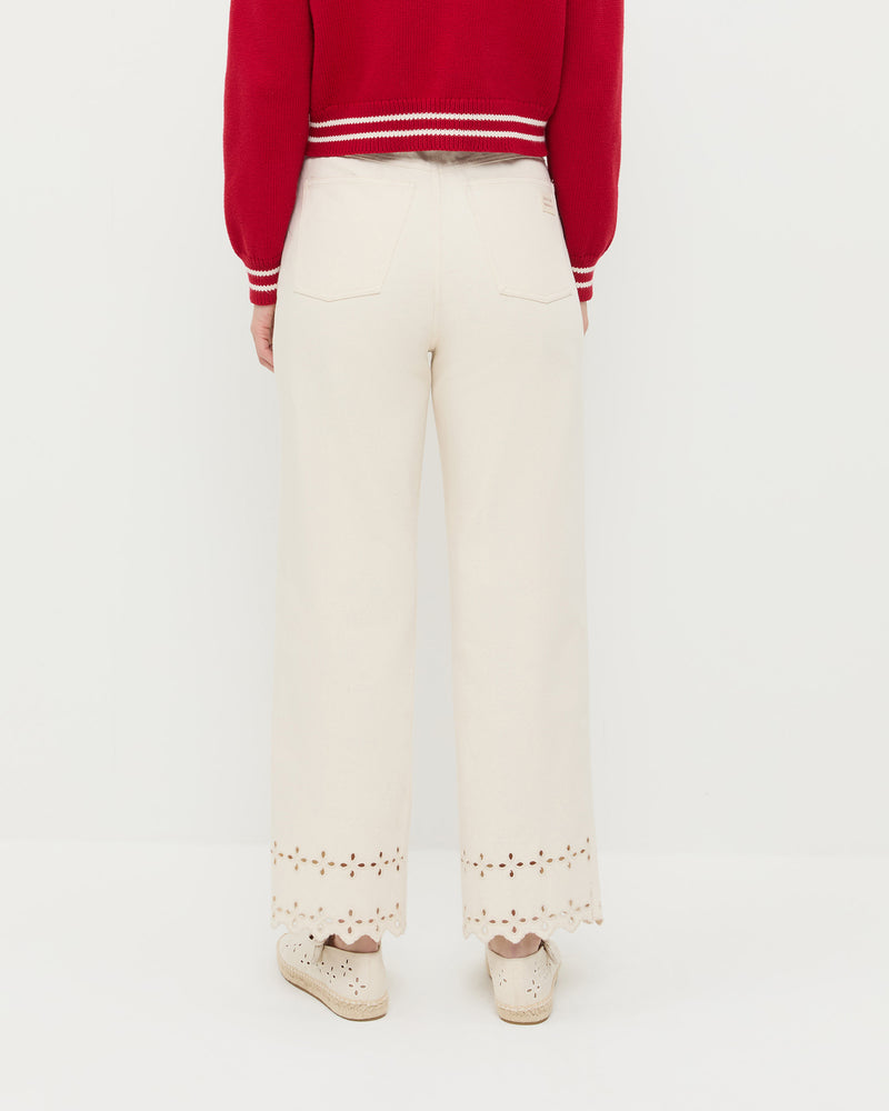 Demi Embroidered Pant in natural cotton, Cove Cardigan in red cotton, and Clover Natural Embroidered Espadrille.
