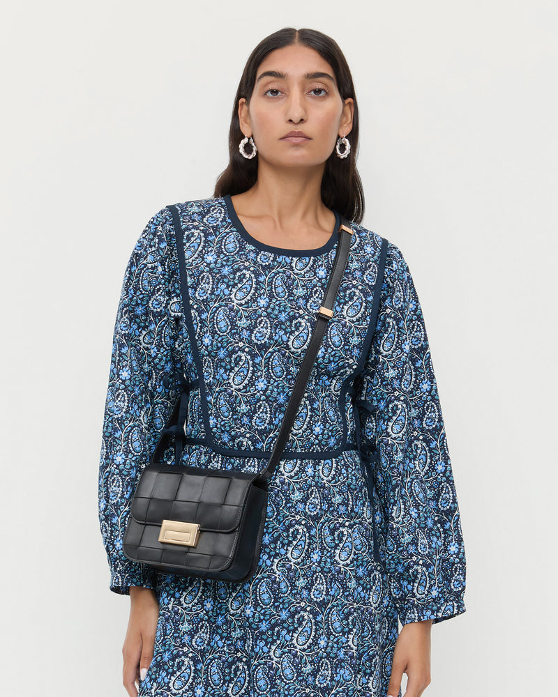 Color: Black Woven