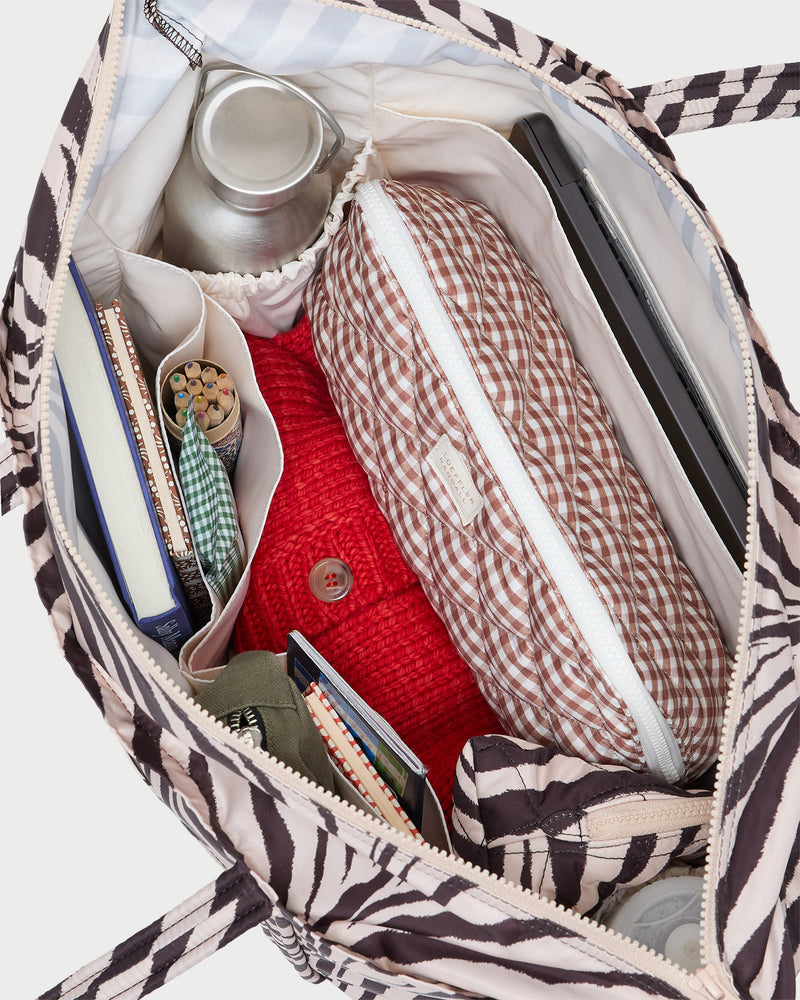 Dina Zebra Travel Tote in zebra print nylon and Frances Brown Gingham Cosmetic Pouch.